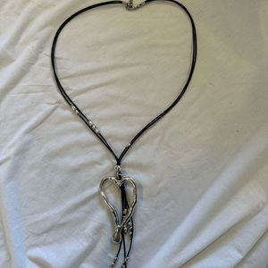 Long necklace with heart pendant